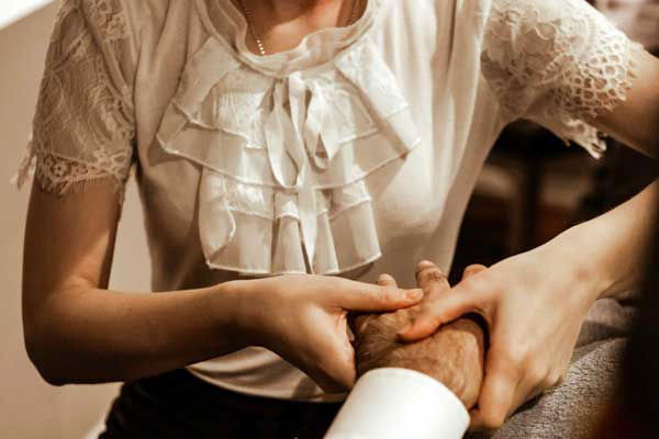 Hand massage and nail care at Face of Man Sydney